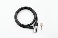 Black security cable with a key on a white background QATAR PRICE