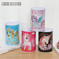Four cylindrical coin boxes with unicorn designs on a wooden surface. QATAR PRICE