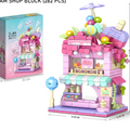 Pink ice cream shop building block set with packaging on a white  background price qatar