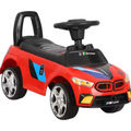 Red toy car with black seat and BMW logo on a white background Price Qatar