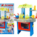 Toy kitchen set with colorful design and accessories, next to its packaging.Price Qatar