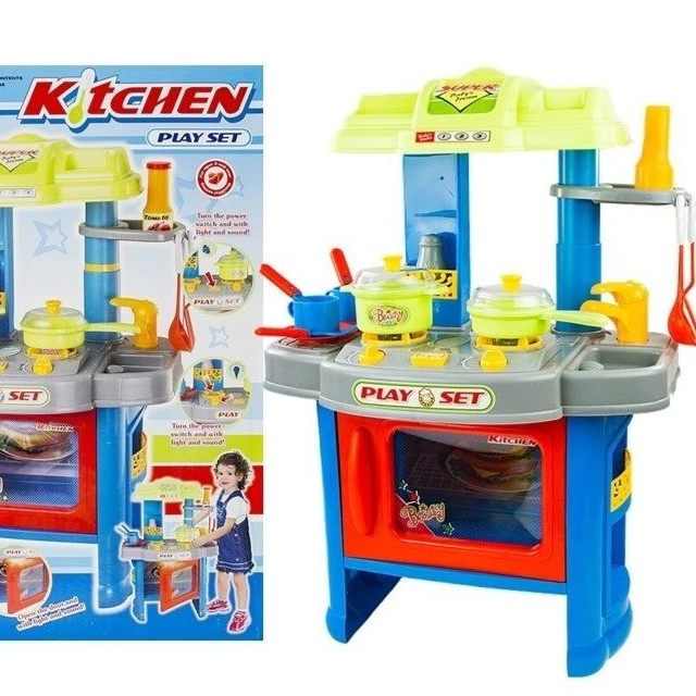 Toy kitchen set with colorful design and accessories, next to its packaging.Price Qatar