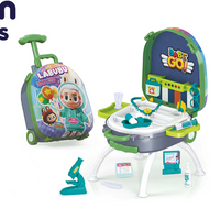 Toy playset with a suitcase and various toys on a white background