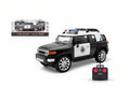 Toy police car with remote control and packaging on a white background Qtar
