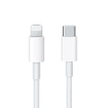White charging cable with Lightning and USB-C connectors on a white  qatar price